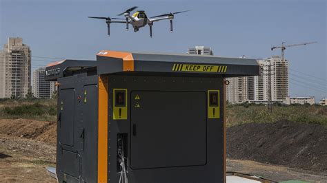 drone system flies recharges  swaps payloads