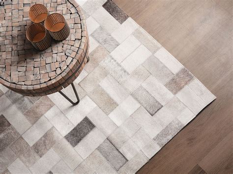 tapis en cuir avec motifs geometriques    cm korfez belianifr