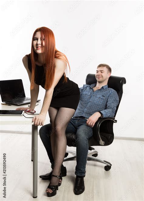 Fotografia Do Stock Sexy Secretary Flirting With Boss In The Workplace