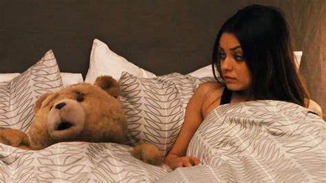 mila kunis in bed with a bear youtube