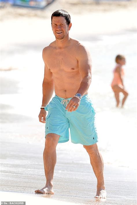 mark wahlberg shows off his hunky shirtless physique in a