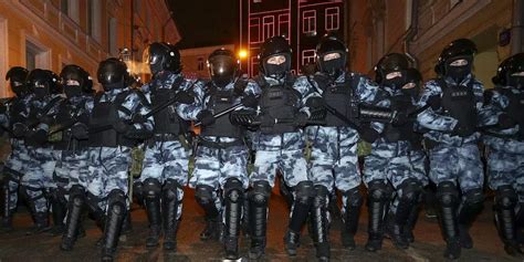 riot gear clad russian police violently crackdown  peaceful protests
