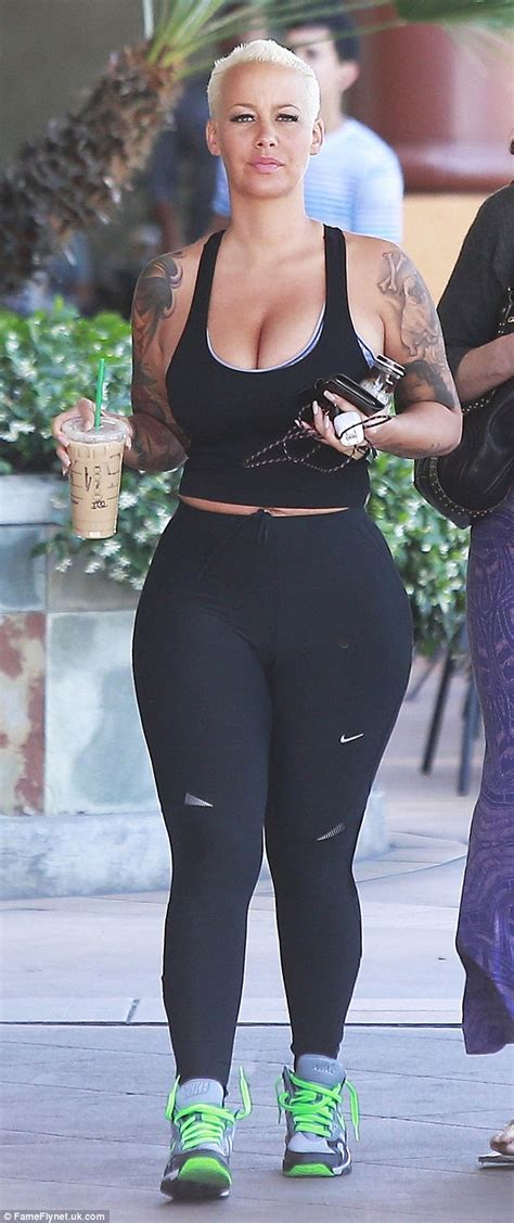 amber rose shows off her famous assets in super tight gym gear daily