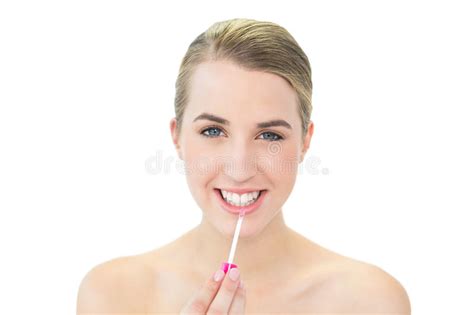 Smiling Attractive Blonde Applying Lip Gloss Stock Image Image Of