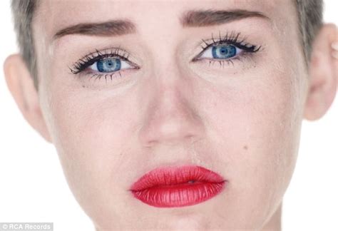 narcissistic miley cyrus poses in shorts and bra for