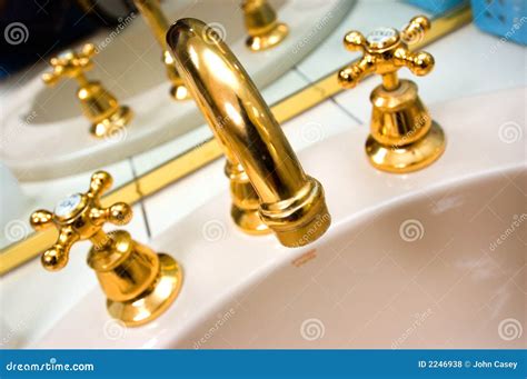 gold plated taps royalty  stock  image
