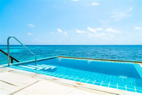 premium photo swimming pool  sea view