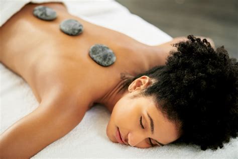 how hot stone massage benefits mind and body well good