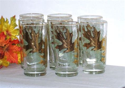 8 Retro Tumblers Gold Leaves On Mint Lined Background