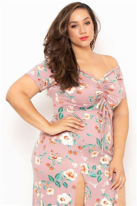 this plus size stretch knit dress features a v neckline ruched