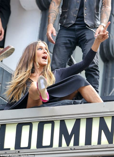 Sarah Jessica Parker Almost Has A Wardrobe Malfunction During Rooftop