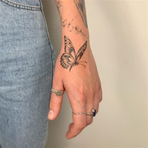 butterfly tattoo  hand