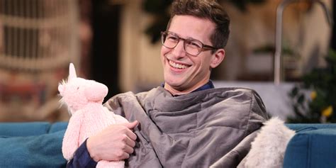 andy samberg reacts to being called a sex symbol watch andy samberg busy philipps just jared