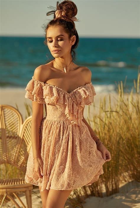 Kimbella - A lace dress with frills and sequins | Dresses