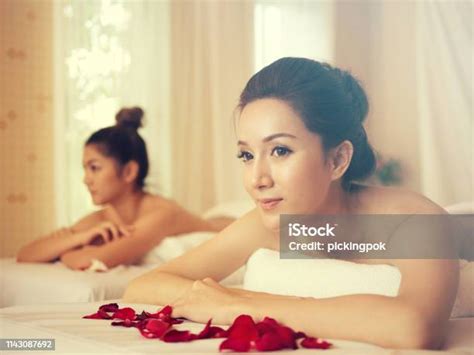 Young Asian Woman Brunette Skin Relaxing In Spayoung Woman Lying Down