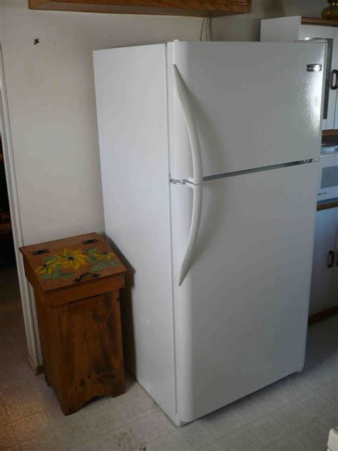 white refrigerator hensleys estate services