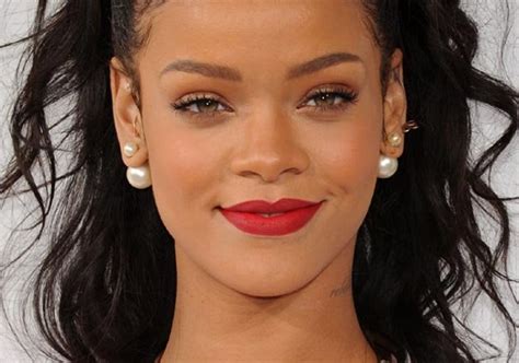 Rihanna Flaunts Skin At Barbados Carnival Parade Hollywood News