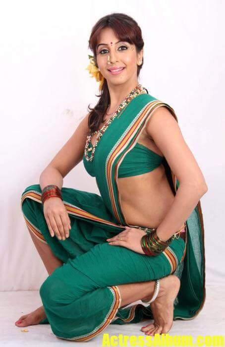 sanjana hot spicy photoshoot in saree actress album