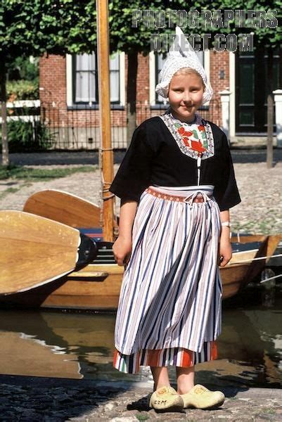 Girl In A Traditional Dutch Costume At The Zuider Zee Museum In