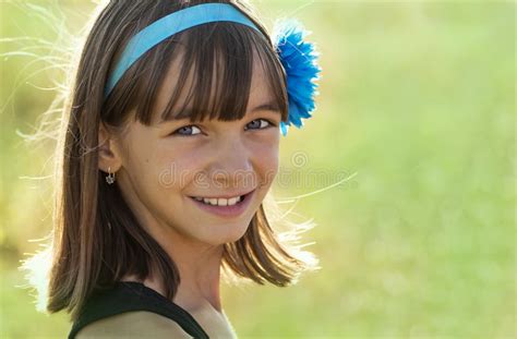 portrait of a beautiful smiling teen girl of european