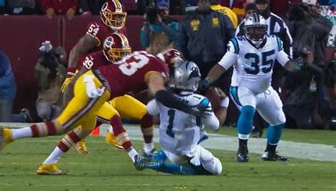 cam newton hit in head while sliding gets penalty larry