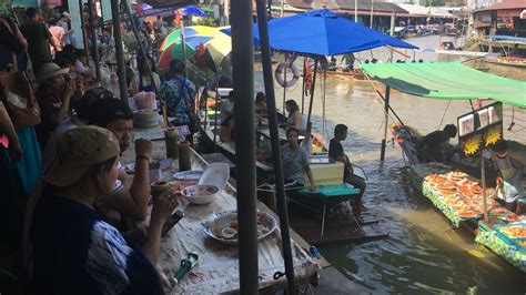 visit a floating market and railway market near bangkok