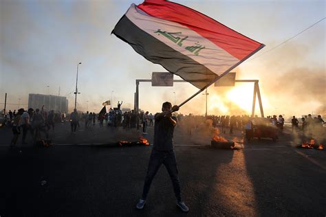 iraq fired  general  beat isis  protests  tearing  country