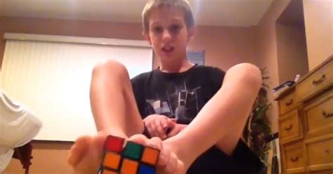 youtuber uploads video of himself solving rubik s cube with his feet