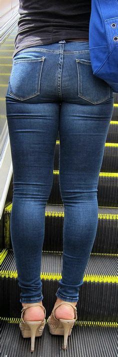 eva notty wearing a blue jeans rear view milf busty