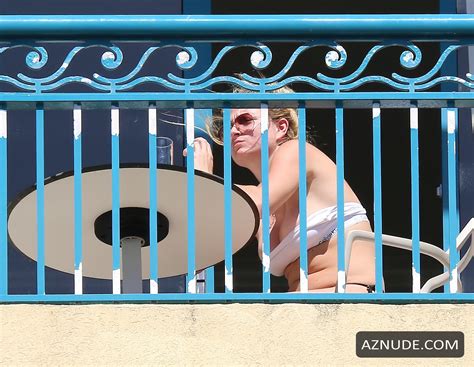 zara holland sexy enjoying vacation on her balcony in barbados aznude
