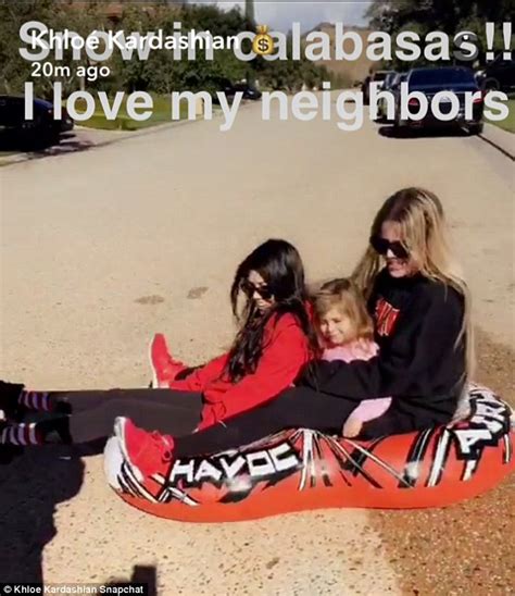 khloe and kourtney kardashian go sledging on neighbor s lawn in calabasas daily mail online