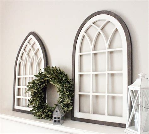 farmhouse arched window pane  distressed white finish  tall rustic frame  wall
