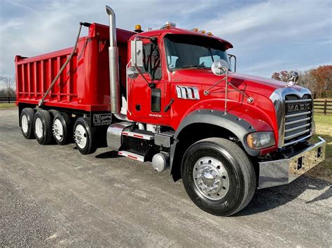 mack granite gu quad axle dump truck mp hp automatic