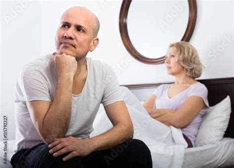 Mature Couple Having Quarrel In Bedroom Stockfotos Und Lizenzfreie