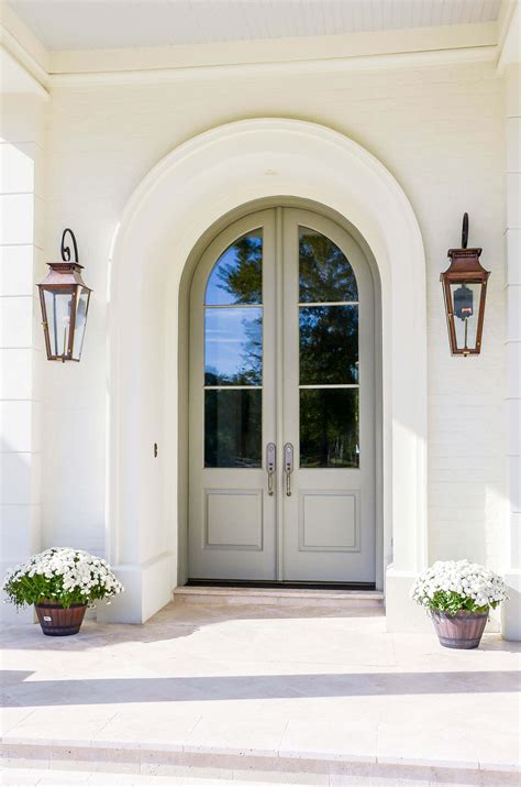 stunning italianates frame  front door bevolo exterior lighting arched exterior doors