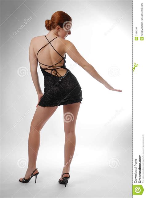 model dancing in short dress rear view stock images
