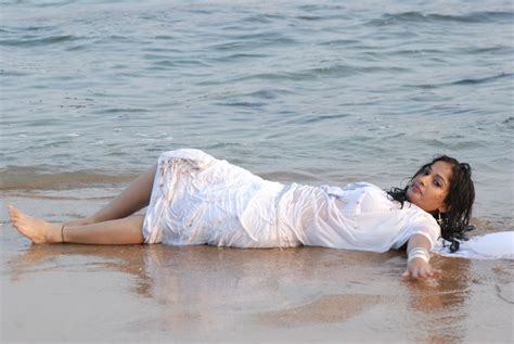 Actress Madhavi Lataha With Saree In Beach Hot And Wet