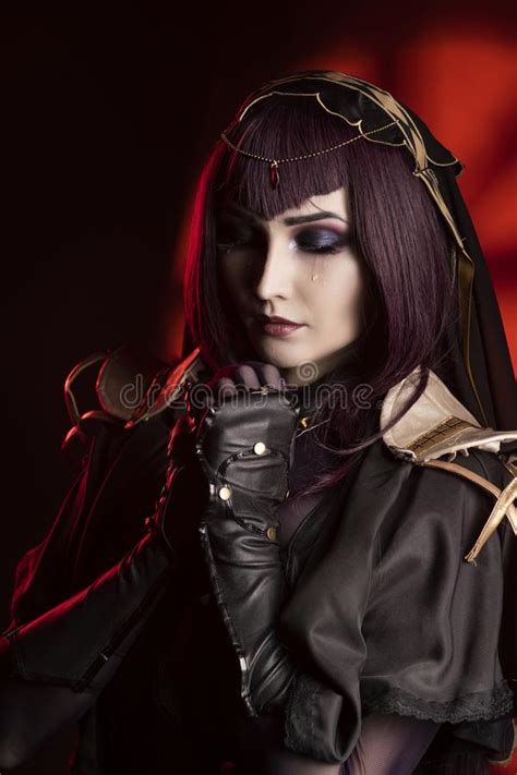 A Beautiful Busty Cosplay Girl Wearing An Erotic Leather Costume