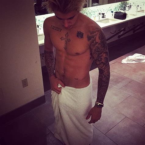 justin bieber proves his bulge is real and john travolta has a new gym buddy queerty