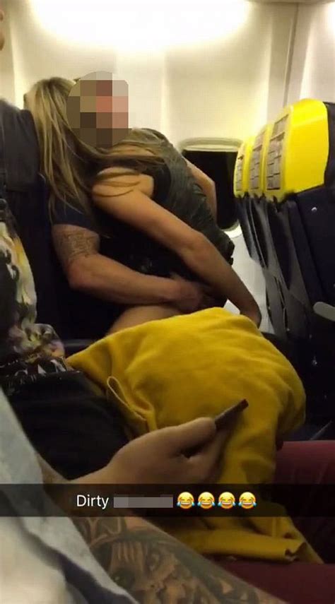 stunned ryanair passengers stare open mouthed as couple