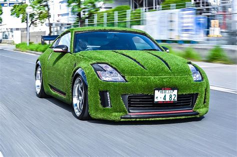 grass wrapped nissan  takes  green    level carbuzz