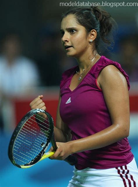 sania mirza photos in tight t shirt and shorts during