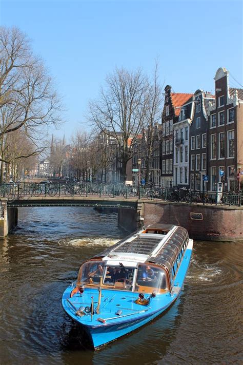 amsterdam canal  boat editorial image image  capitol