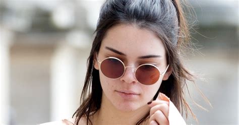 kendall jenner flashes her nipple piercing in satin gown as she goes