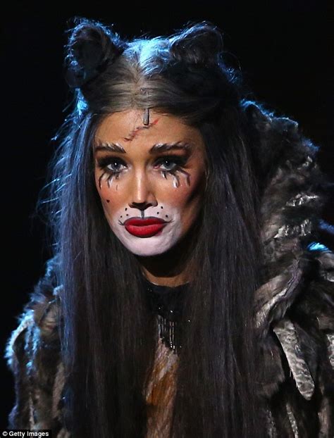 delta goodrem undergoes extreme feline makeover for her role in cats