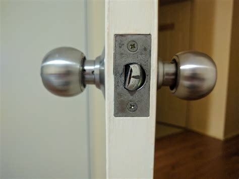 lock   stop door knob latch  twisting  sticking  strike plate home
