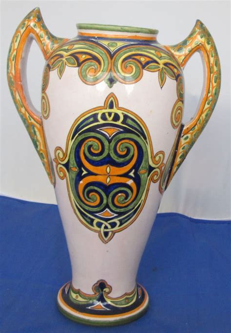 henriot  handled vase circa  sold