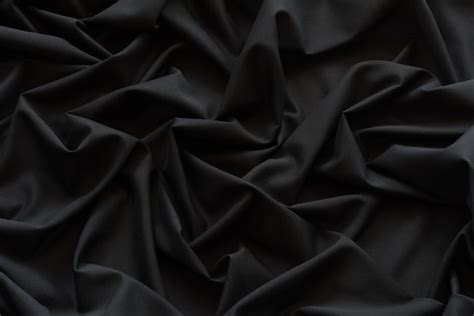premium photo black cloth background  texture grooved  black fabric abstract