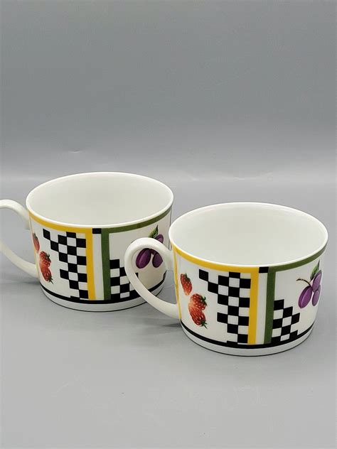 lovely pair  fine china tea cups  studio nova