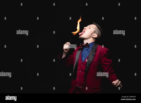 Fire Show Fakir Magician Swallows Burn And Puts Out Tongue In Mouth
